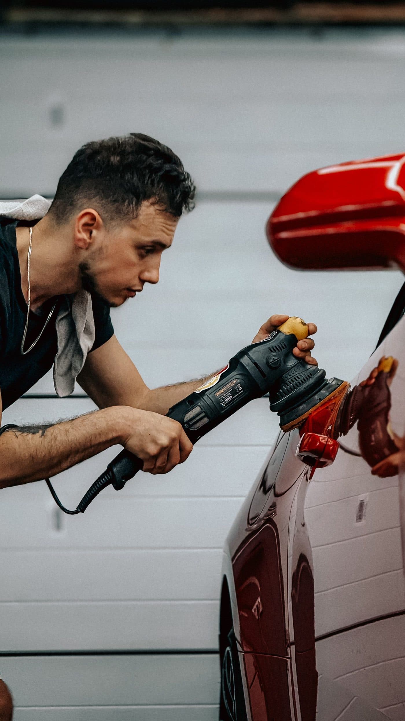 Machine polishing a car panel